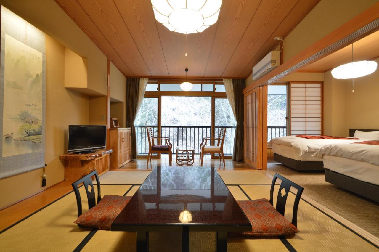 Kurokawa Onsen Oku No Yu Hotel Minamioguni Kültér fotó
